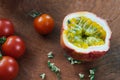 Cherry tomatoe vs passion fruit Royalty Free Stock Photo