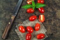 Cherry tomatoes with basil leaf Royalty Free Stock Photo