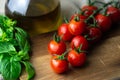 Cherry tomatoes with basil and oil