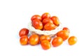 Cherry Tomatoes in a basket. Solanum lycopersicum L. var. cerasiforme. isolated on white background and clipping path Royalty Free Stock Photo