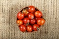 Cherry tomatoes on burlap Royalty Free Stock Photo