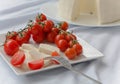 Cherry tomatoes with fresh sicilian cheese