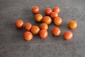 Cherry tomatoes on grey concrete kitchen dresser