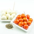 Cherry tomatoes, mozarella and ground basil Royalty Free Stock Photo