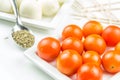 Cherry tomatoes, mozarella and ground basil Royalty Free Stock Photo