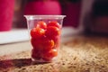 Cherry tomatoes in plastic container â fresh produce and the challenge of sustainable packaging in modern agriculture Royalty Free Stock Photo
