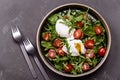 Cherry Tomatoes, poached eggs and herbs mix salad Royalty Free Stock Photo