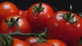 Cherry tomatoes rotating on a plate