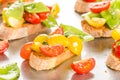 Cherry tomatoes and snow peas crostini Royalty Free Stock Photo