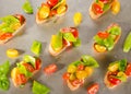 Cherry tomatoes and snow peas crostini Royalty Free Stock Photo