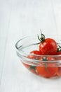 Cherry tomatoes in water drops in a glass bowl Royalty Free Stock Photo