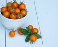 Cherry tomatoes in a white bowl