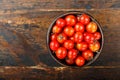 Cherry tomatoes on wooden background Royalty Free Stock Photo