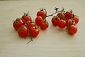 Cherry Tomatoes on wooden surface