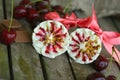 Cherry vanilla ice-cream with caramel topping. Closeup Royalty Free Stock Photo