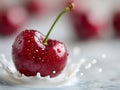 A cherry with water droplets on top of it sitting on a table Royalty Free Stock Photo