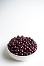 Cherry on a white background, a beautiful screensaver on your phone, a web article about cooking and the benefits of