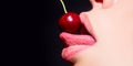 Cherry in woman mouth. Cherries on woman lips. Tongue lick cherry, macro, close up. Mouth lick cherry.
