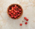 Cherry in wooden plate Royalty Free Stock Photo