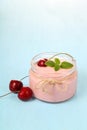 Cherry yogurt and ripe cherry Royalty Free Stock Photo