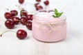 Cherry yogurt and ripe cherry Royalty Free Stock Photo