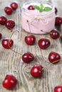 Cherry yogurt and ripe cherry Royalty Free Stock Photo