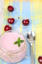 Cherry yogurt and ripe cherry Royalty Free Stock Photo