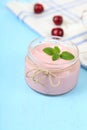 Cherry yogurt and ripe cherry Royalty Free Stock Photo