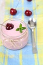 Cherry yogurt and ripe cherry Royalty Free Stock Photo