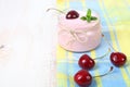 Cherry yogurt and ripe cherry Royalty Free Stock Photo