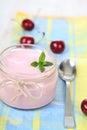 Cherry yogurt and ripe cherry Royalty Free Stock Photo