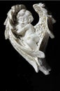 Cherub asleep black backgrounds