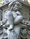 Cherub at base of New York City street lamp Royalty Free Stock Photo