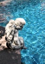 Cherub at pool side