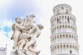 Cherub Statue and the Leaning Tower of Pisa at the Square of Miracles