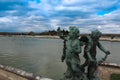 Statues under Blue Sky outside Palace of Versailles Royalty Free Stock Photo