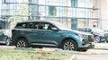 Chery Tiggo 7 Pro parked on the city street. Chinese crossover in Baby Blue color, side view