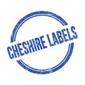 CHESHIRE LABELS text written on blue grungy round stamp