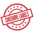 CHESHIRE LABELS text written on red vintage round stamp