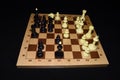 Chess board with black chessmen for skill background Royalty Free Stock Photo