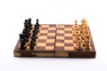 Chess board with black and white figurines on a white background Royalty Free Stock Photo