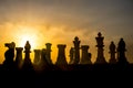chess board game concept of business ideas and competition and strategy ideas. Chess figures on a chessboard outdoor sunset backgr Royalty Free Stock Photo