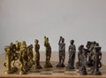 Chess board game, with kings and queens discussing for compromise, peace talks with  their army behind the kings waiting Royalty Free Stock Photo