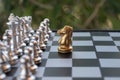 Chess board game. A knight faces all the enemies. Leader with courage concept Royalty Free Stock Photo
