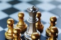 Chess board game. Queen stand and been surrounded by enemy's pawns. Referring to the ones who is in a trouble. Obstacles are Royalty Free Stock Photo