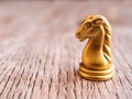 Chess board game horse staying against full set of chess pieces. Royalty Free Stock Photo