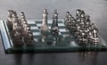 Glass pieces and chess board Royalty Free Stock Photo