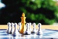 Chess board, golden king is in big troubles. Top view Royalty Free Stock Photo