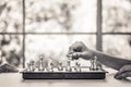 Hand playing chess board Royalty Free Stock Photo