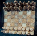 Chess board with marble chess pieces